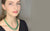 Wearing multiple different length necklaces