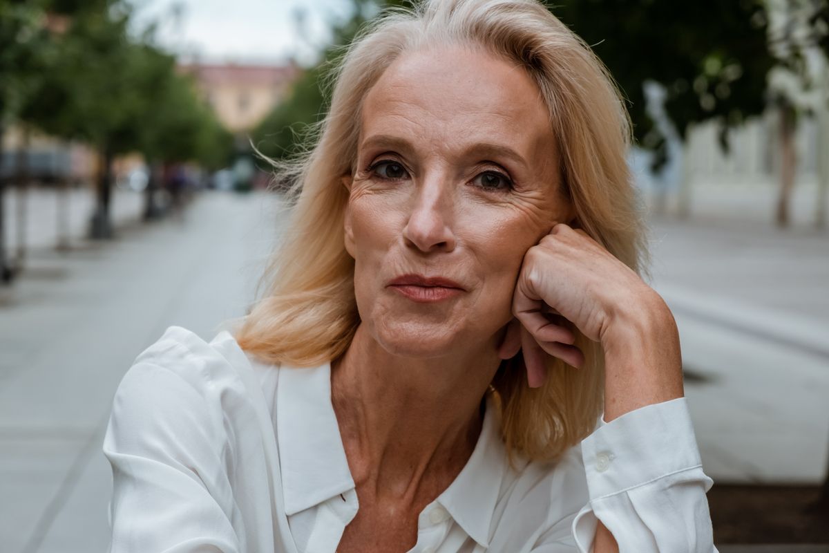 older women styled in white shirt