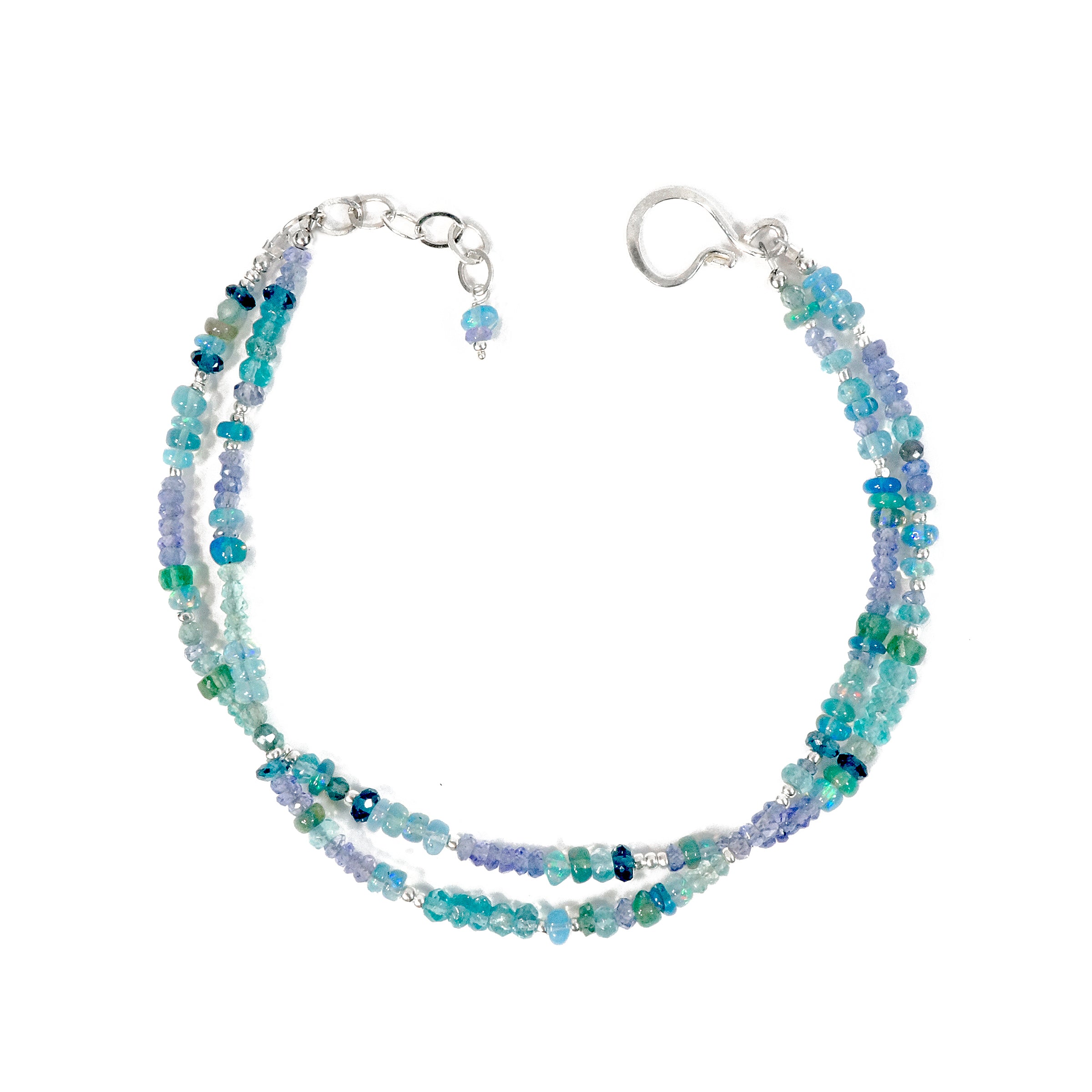 Multistrand beaded bracelet with blue and green beads on a white background