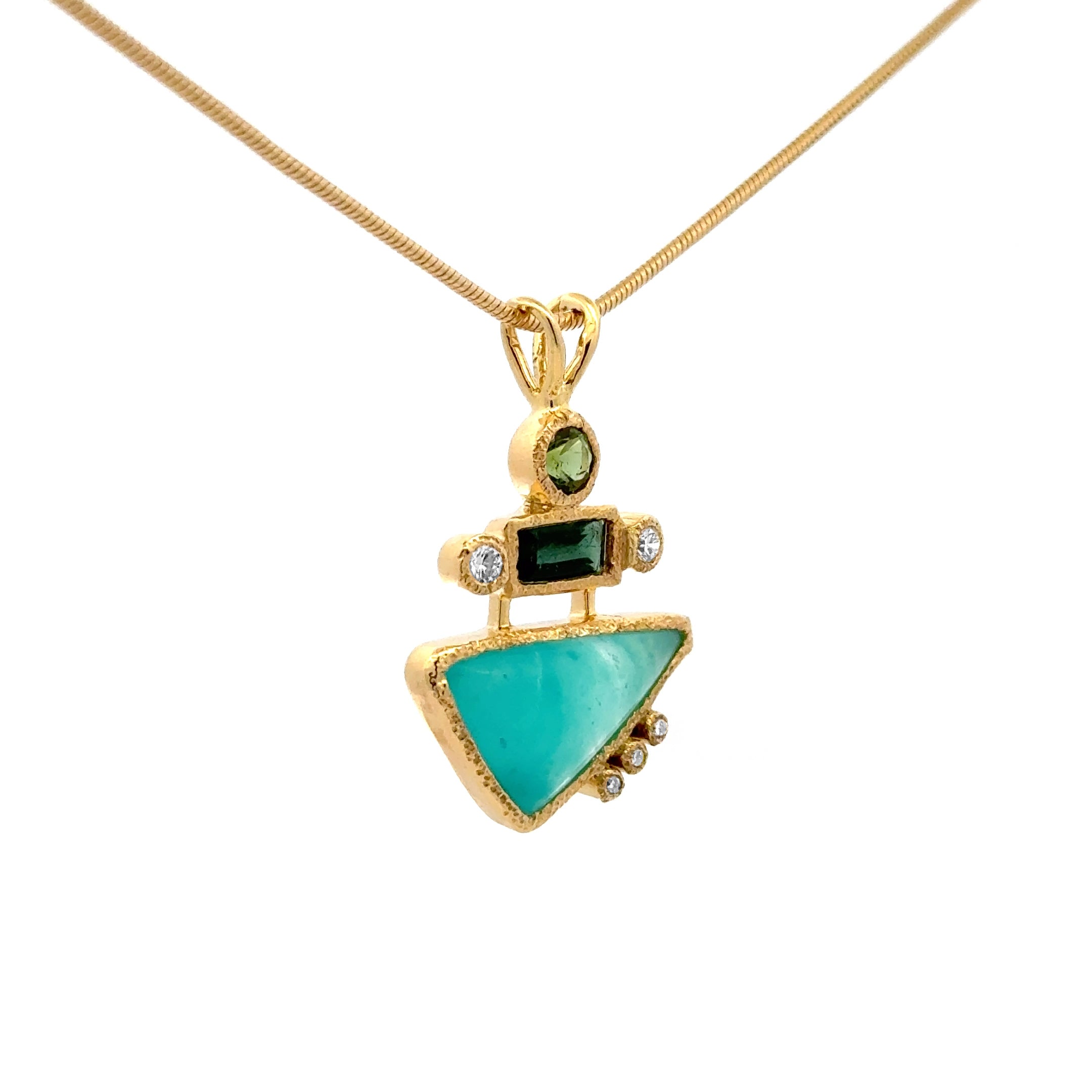 14k gold gem silica pendant with tourmalines and diamonds.