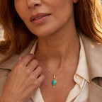 14k gold gem silica and diamond pendant on model