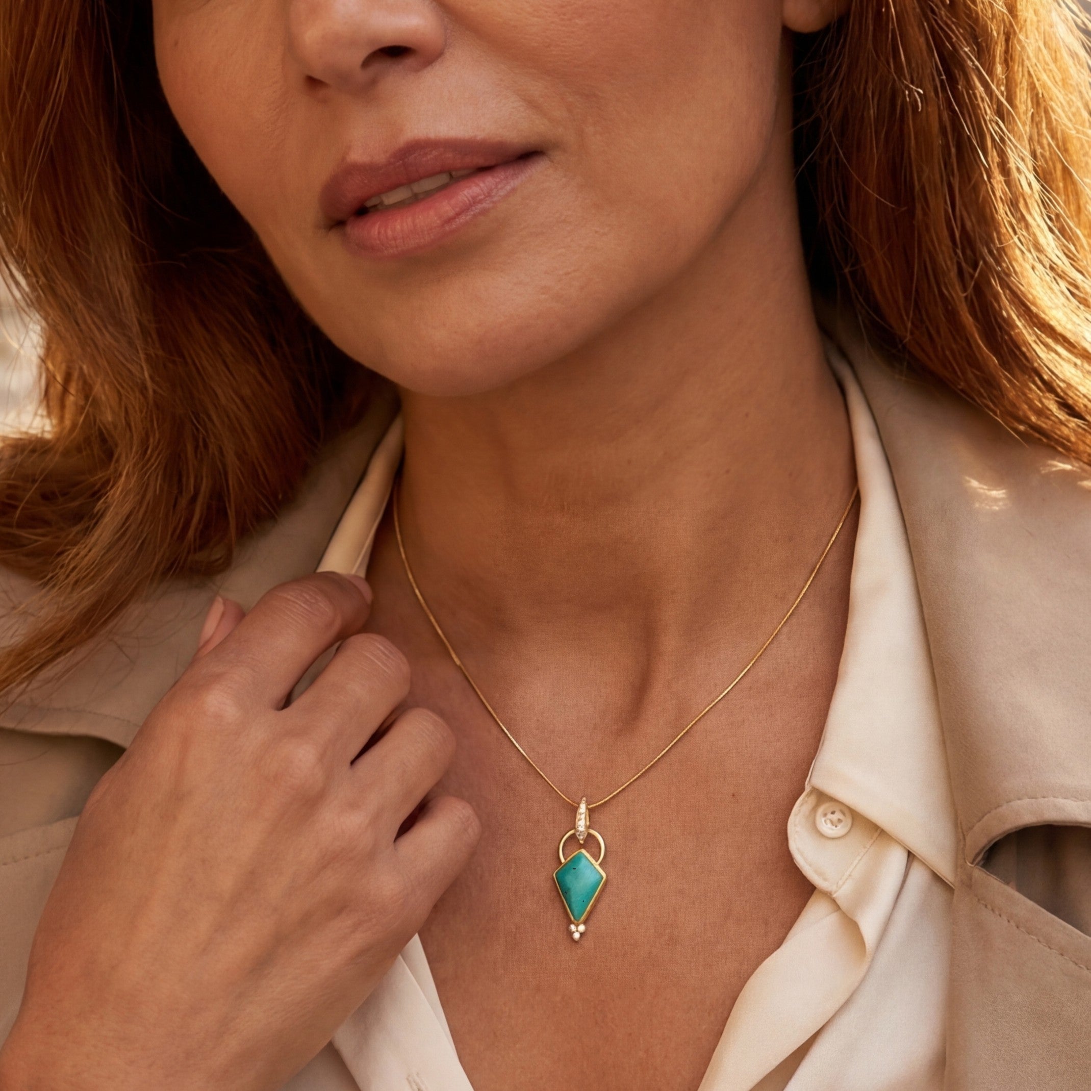 14k gold gem silica and diamond pendant on model