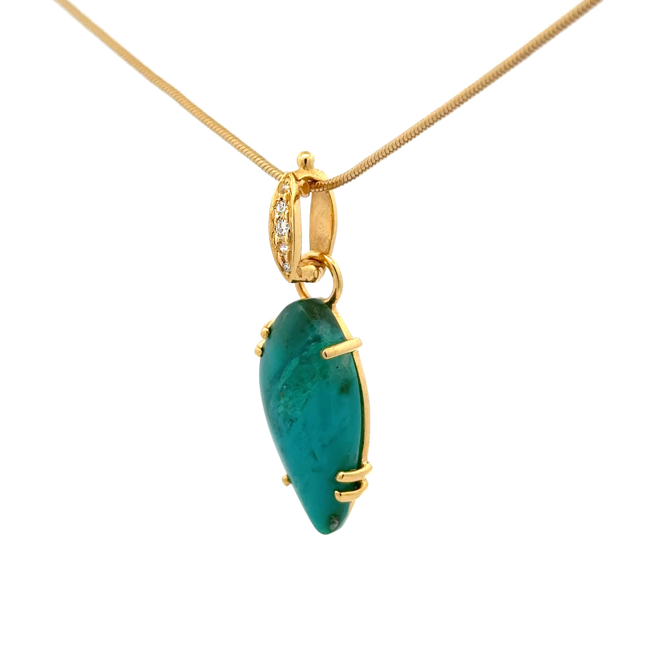 Side view of 14k gold gem silica chrysocolla pendant on diamond hinged enhancer