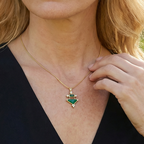 14k gold pendant with gem silica chrysocolla, tourmaline and diamonds on model.