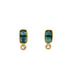 Pair of gold aquamarine rectangle stud earrings with diamond accents on a white background