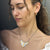 9 Tab Mixed Metal Necklace with White Lab Diamond