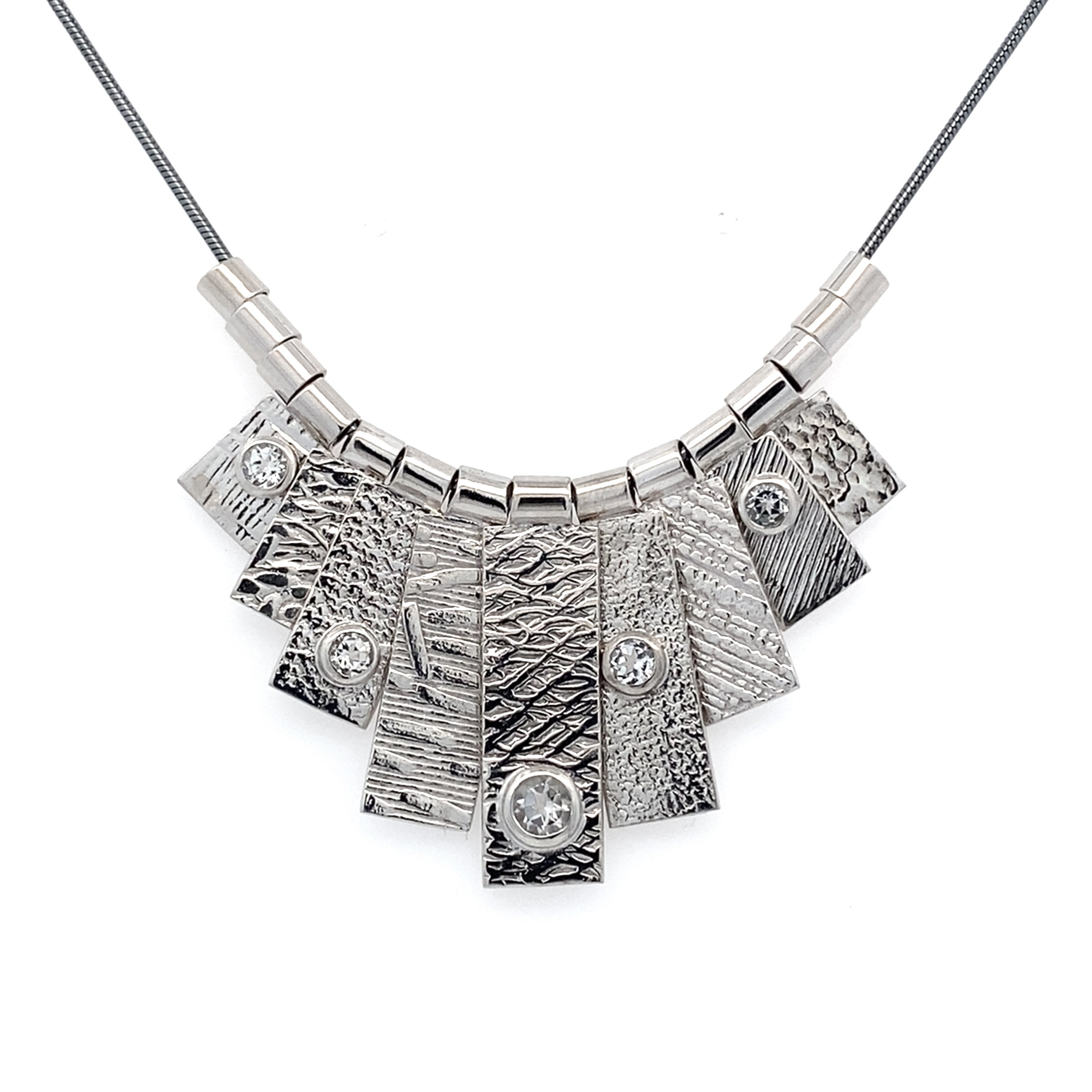 9 Tab Silver Necklace with White Sapphire