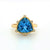 14K Swiss Blue Topaz Trillion Cut and Diamond Ring